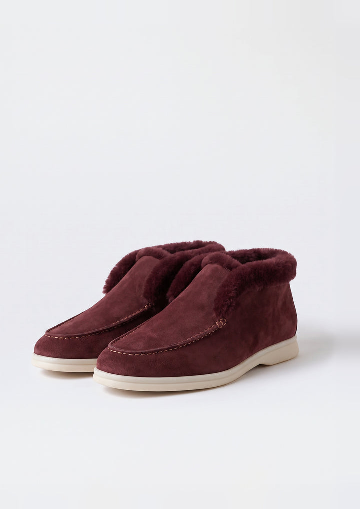 Courchevel Shearling Loafers in Burgundy, pair on a light grey studio background