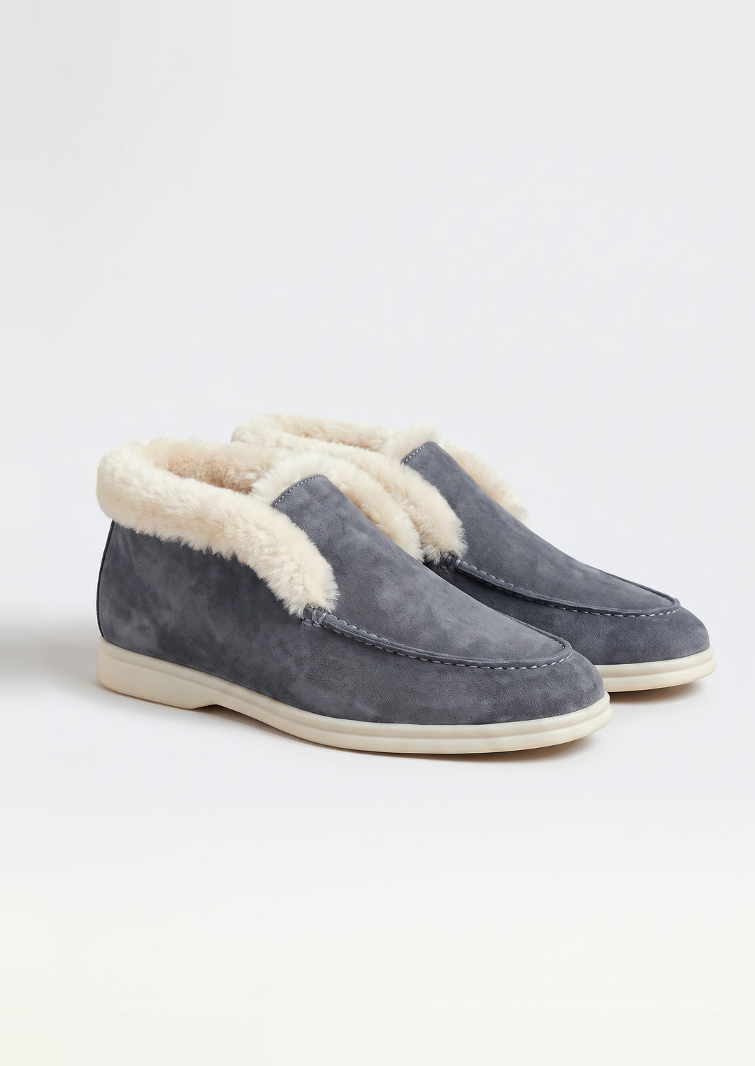 Courchevel Shearling Loafers in Charcoal, pair on a light grey studio background