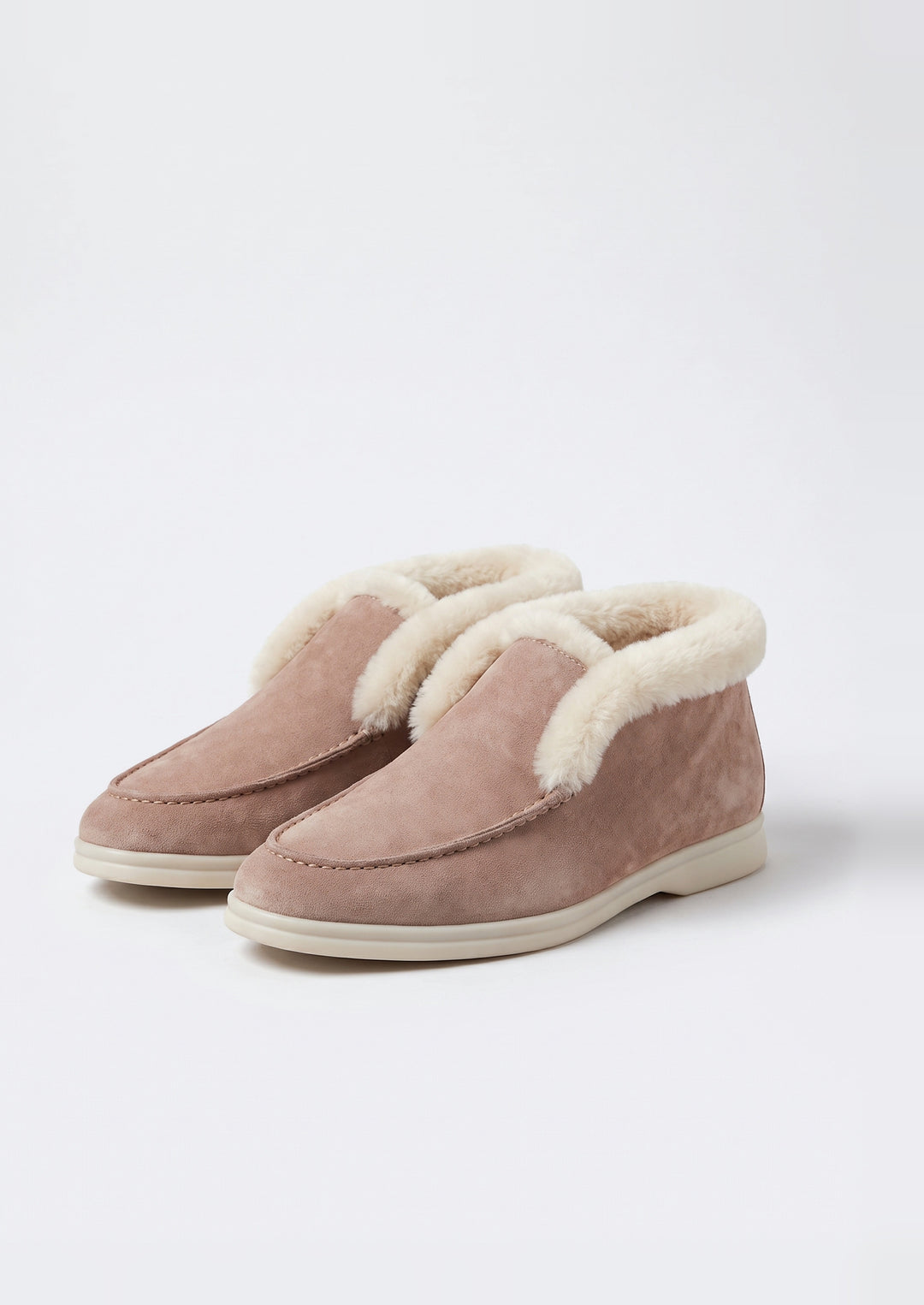 Courchevel Shearling Loafers in Rose Taupe, pair on a light grey studio background