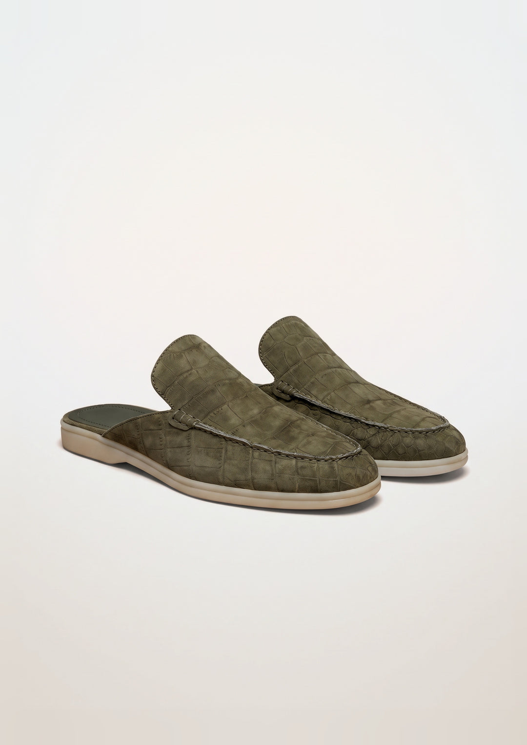 Porto Cervo Croc Mules in Olive, pair on a light grey studio background