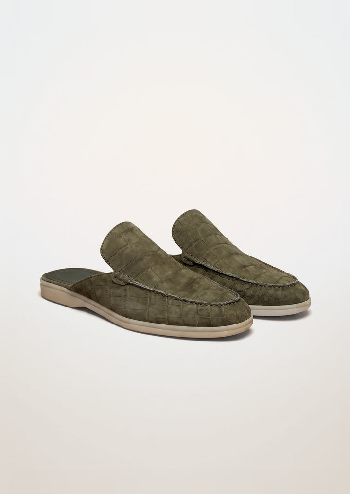 Porto Cervo Croc Mules in Olive, pair on a light grey studio background