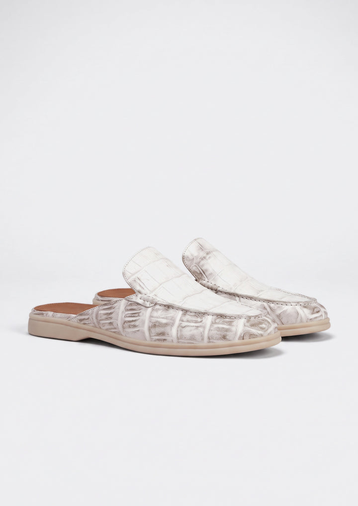 Porto Cervo Croc Mules in White, pair on a light grey studio background