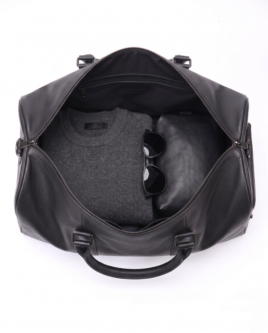The Gstaad 44 leather travel bag in black, interior and pockets