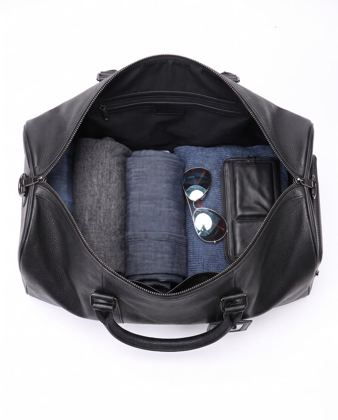 The Gstaad 55 leather travel bag in black, interior and pockets