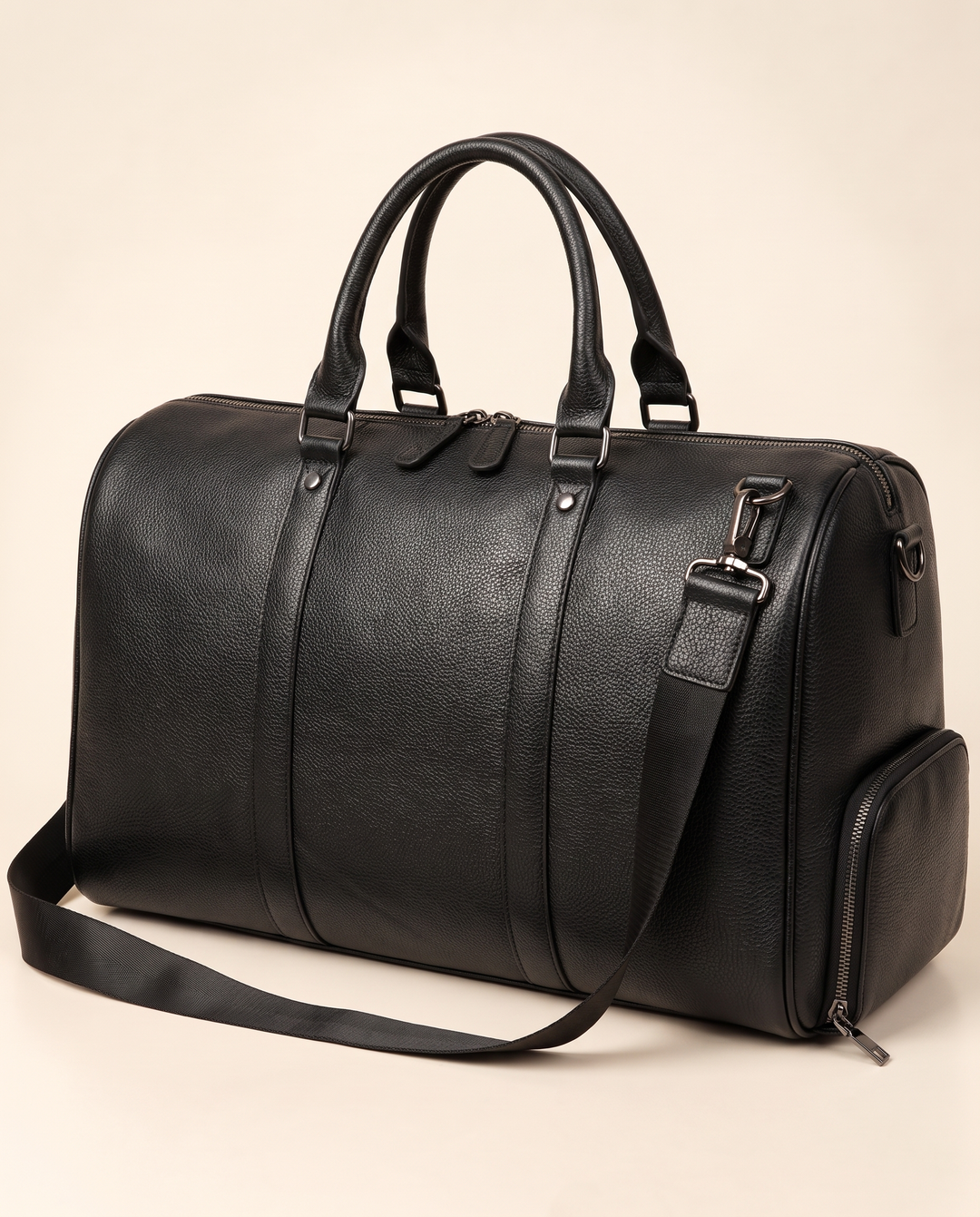 The Gstaad 44 leather travel bag in black, three-quarter view