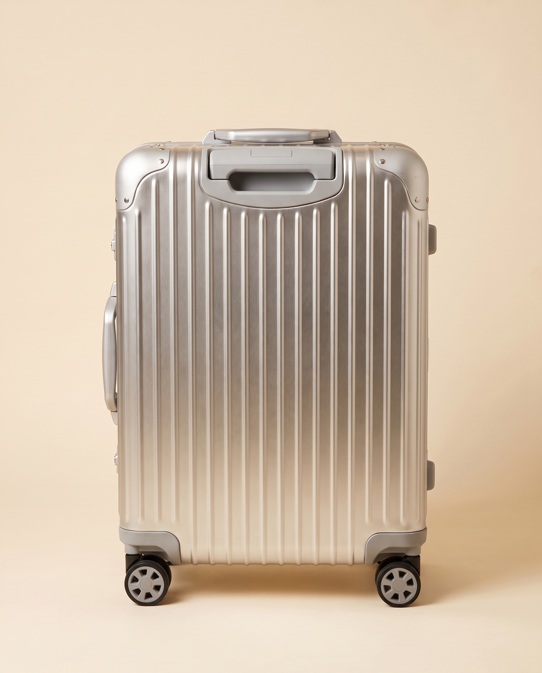 The Verbier aluminum suitcase in silver, back view