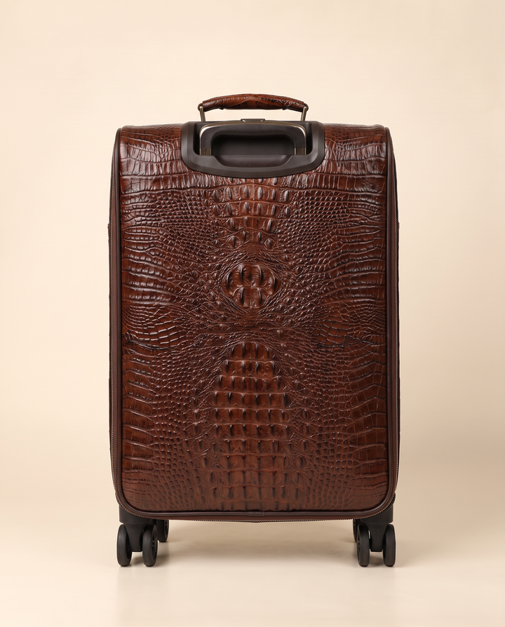 The Zermatt 58 crocodile trolley case in coffee brown, back view
