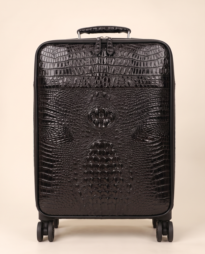 The Zermatt 58 crocodile trolley case in black, front view