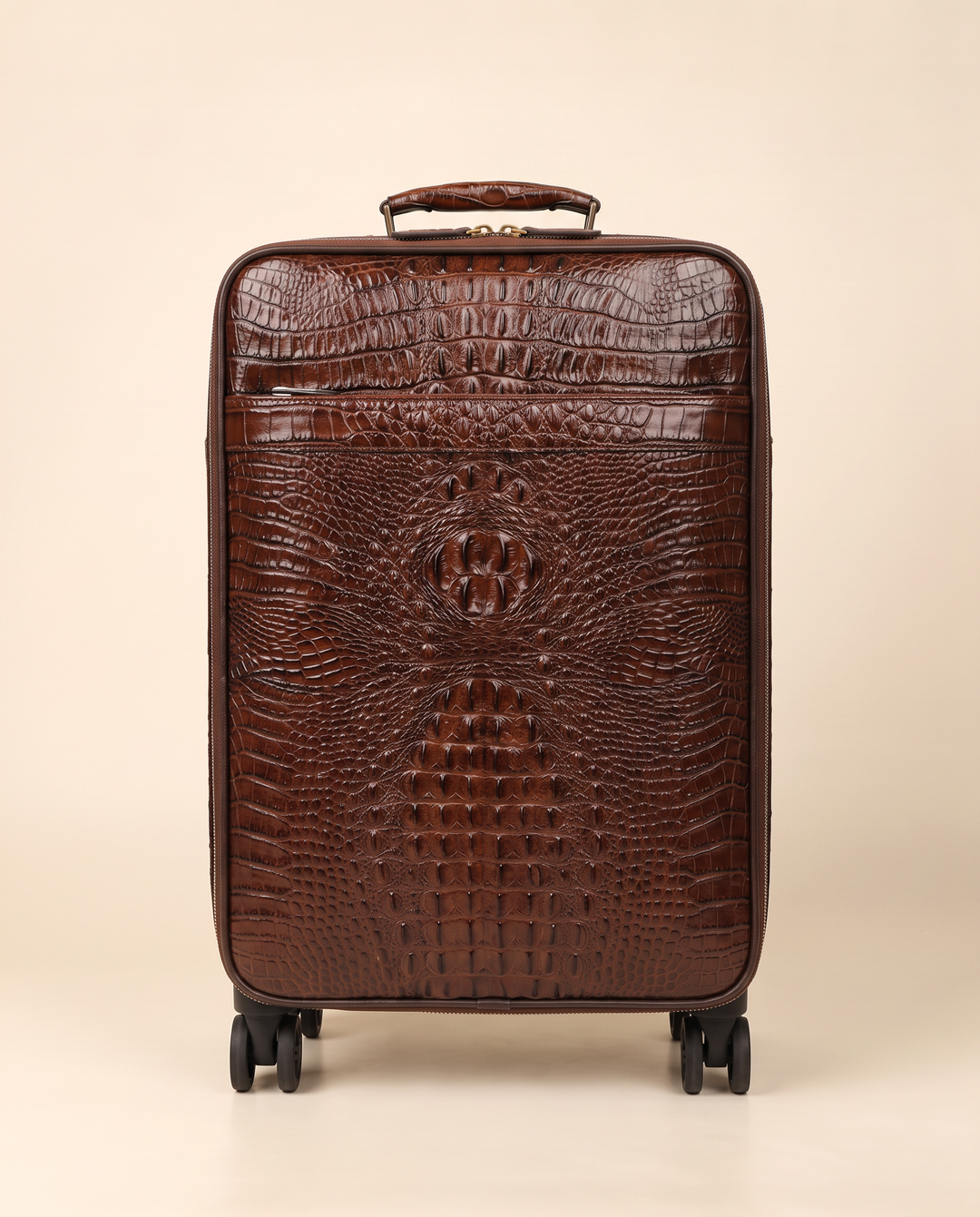 The Zermatt 58 crocodile trolley case in coffee brown, front view