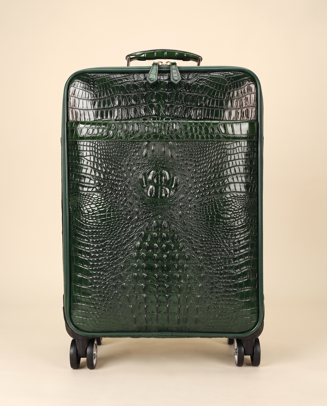 The Zermatt 58 crocodile trolley case in green, front view
