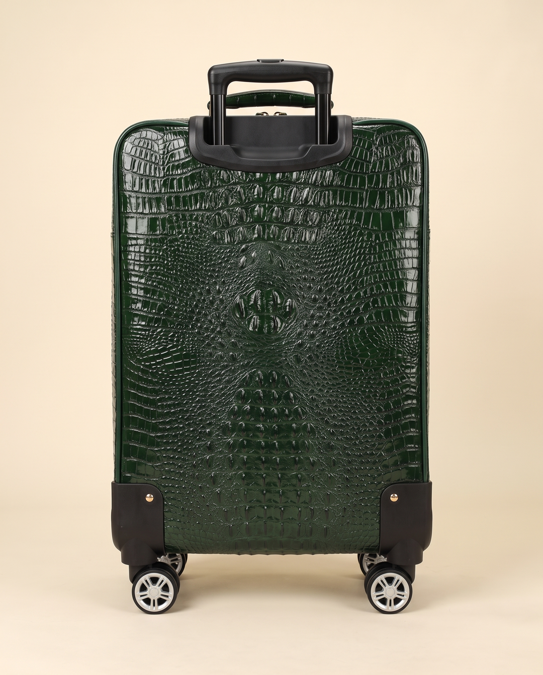 The Zermatt 58 crocodile trolley case in green, back view