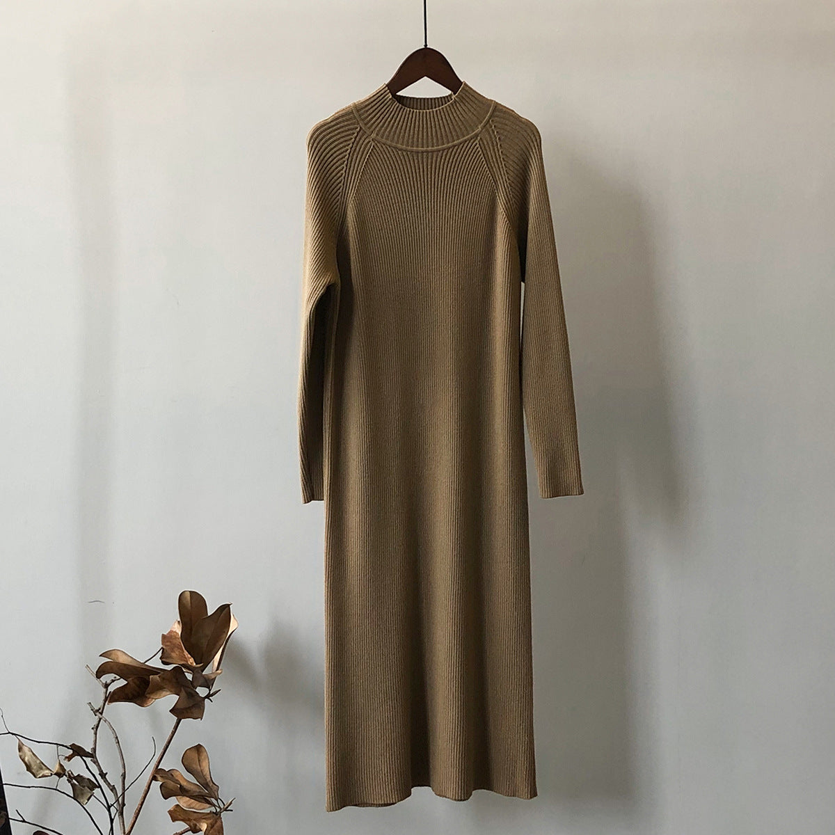Mid-length knitted dress with half turtleneck
