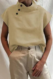 Blusa casual asimétrica con cuello alto y botones sólidos