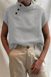 Blusa casual asimétrica con cuello alto y botones sólidos