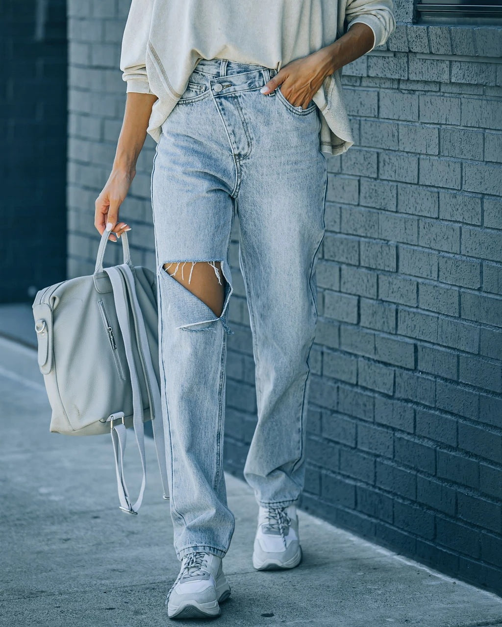 Versatile irregular ripped ripped casual denim trousers