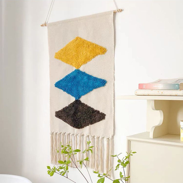 Hand-woven tassel tapestries decorate hanging cloth