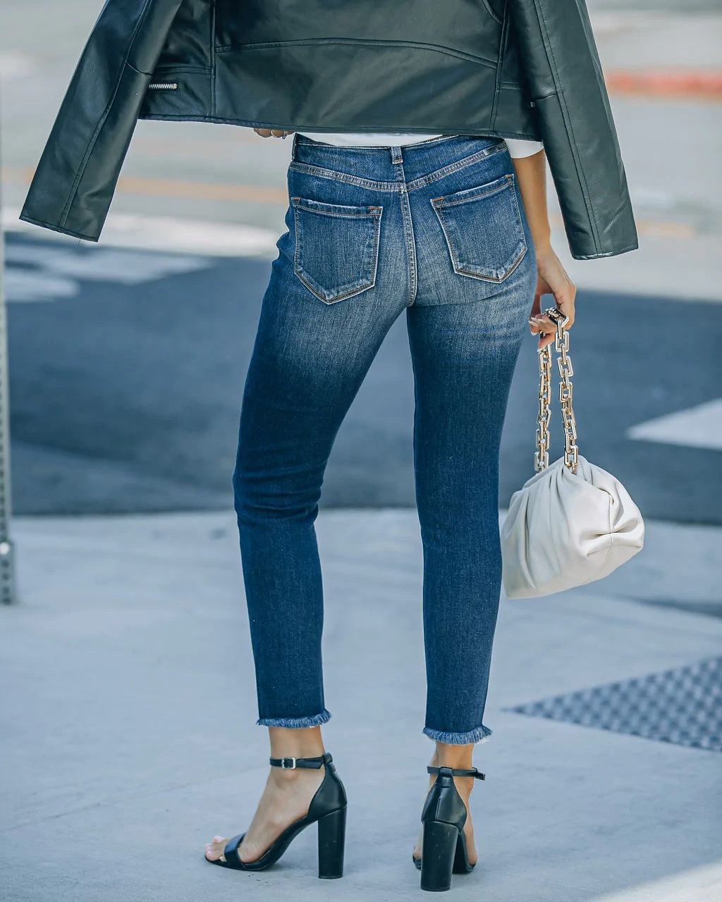 One-breasted ripped stretch-fit jeans