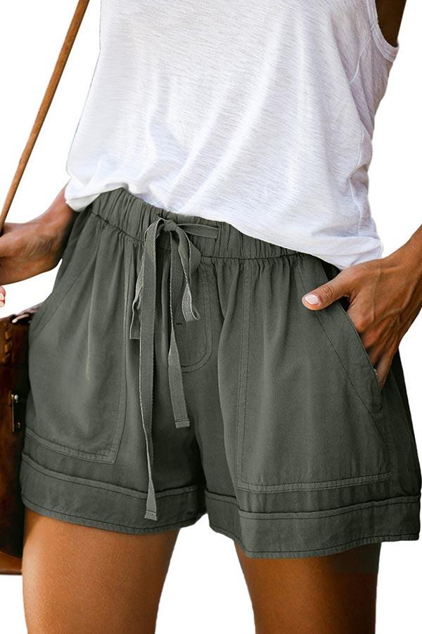 Pantalones casuales con cordón y bolsillos laterales sólidos con paneles