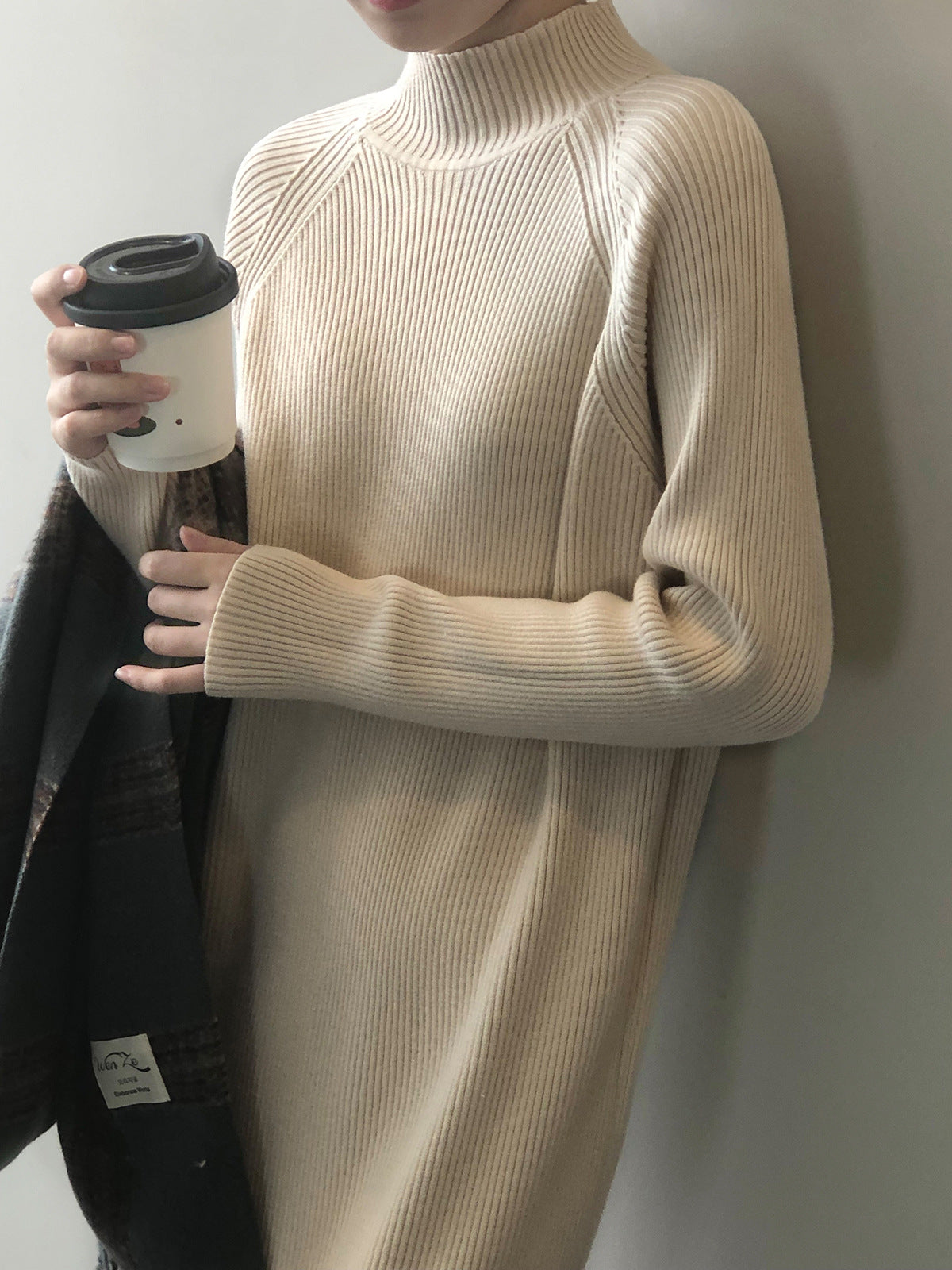 Mid-length knitted dress with half turtleneck