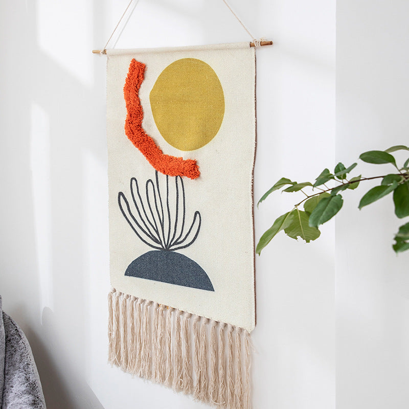 Hand-woven tassel tapestries decorate hanging cloth